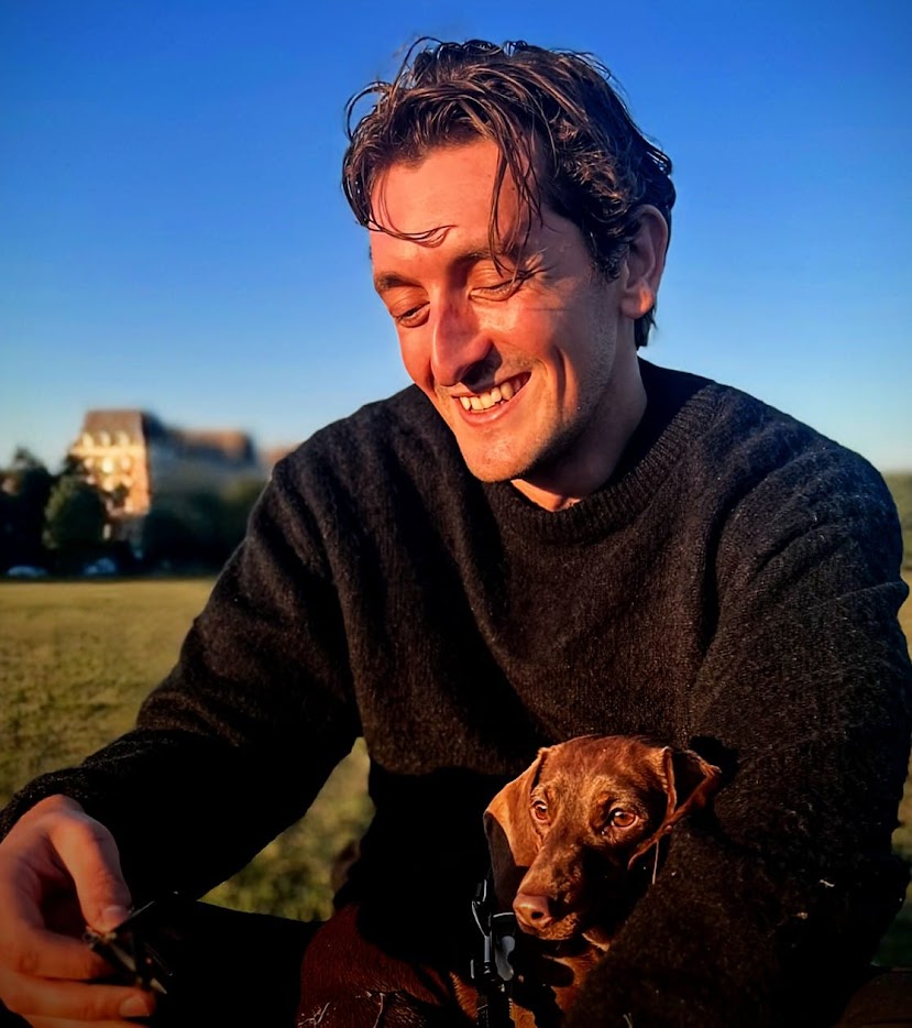Marcus with a happy dog
